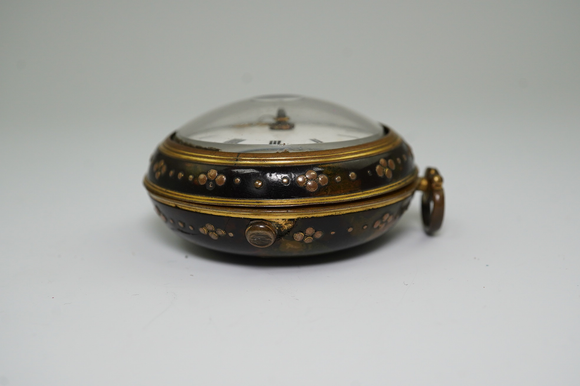 A George III pair cased gold plated pocket watch, with a green stained tortoiseshell outer case, by William Hope, London